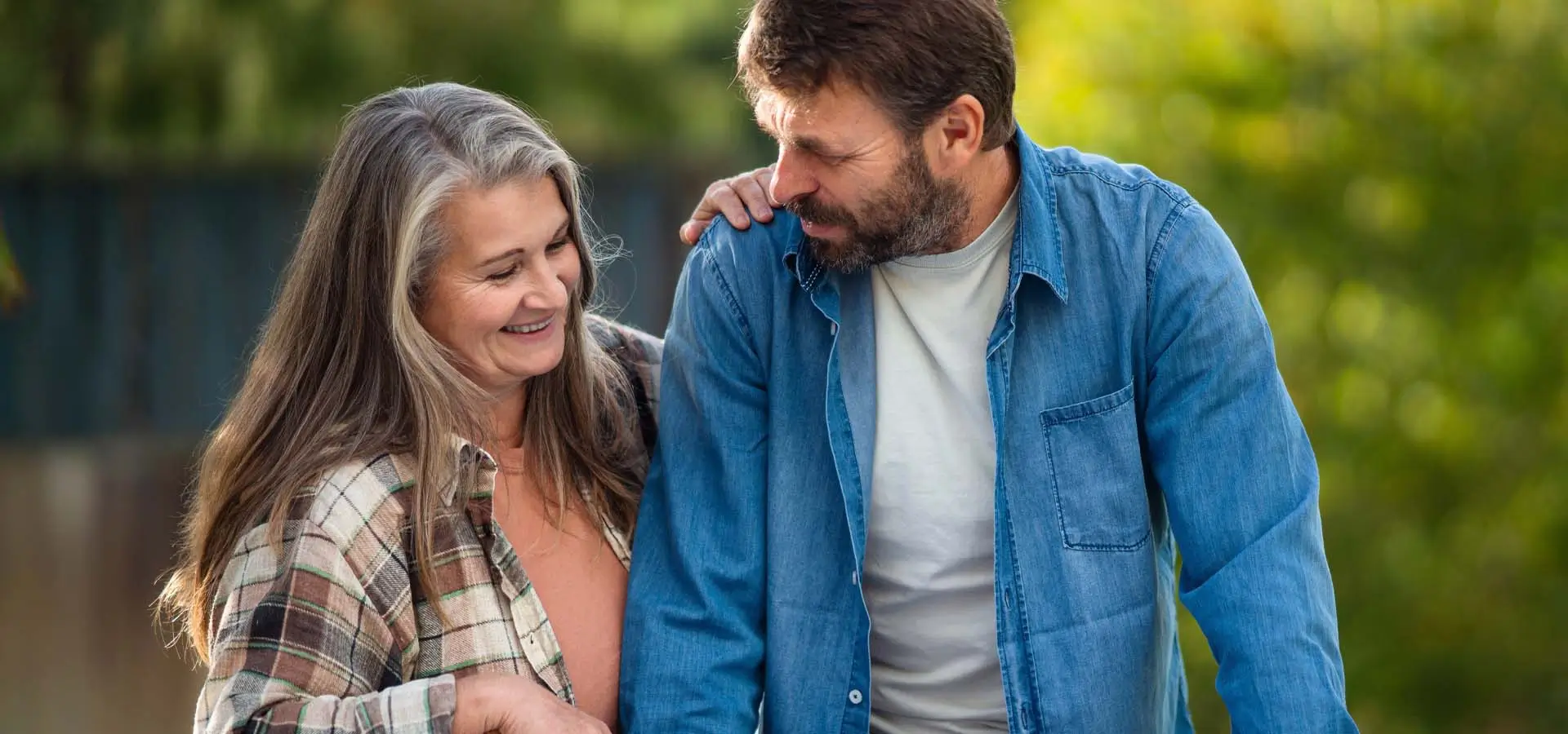 A man and woman having a conversation.